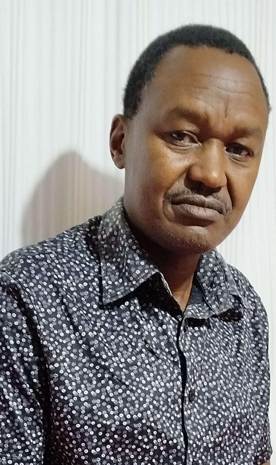 Portrait of Dr Alfred Nyagaka Nyamwange – Kenyan author featured by Bleeding Ink Scribes Publishers